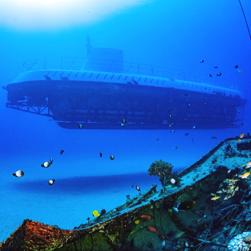 atlantisadventures waikiki submarine explorer tour blue deep water slide