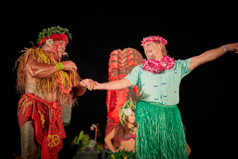 chiefs luau guests perform with dancer