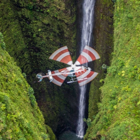 paradisecopters fly through the skies of oahu sacred falls fly over slide