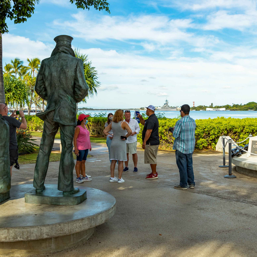 pearl harbor visitor center statue and visitors oahu