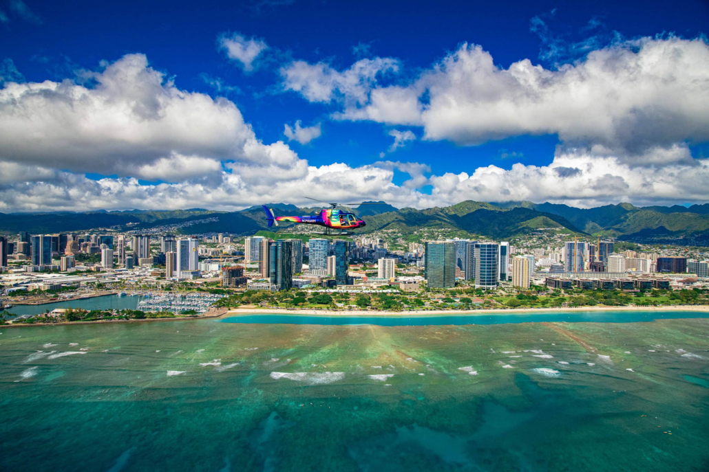 rainbowhelicopters royal crown of oahu fly through city