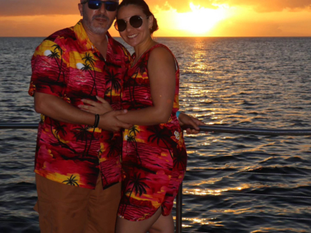 oceanjoycruises koolina sunset snorkel cruise couple at sunset slide